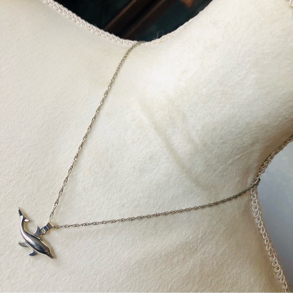 Vintage swimming dolphin pendant on chain necklace
